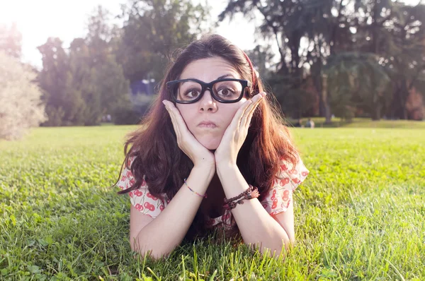 Girl with big glasses at the park — Stock Photo, Image