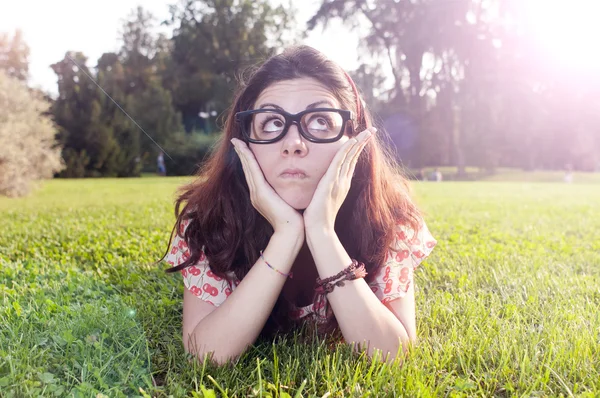 Girl with big glasses at the park — Stock Photo, Image