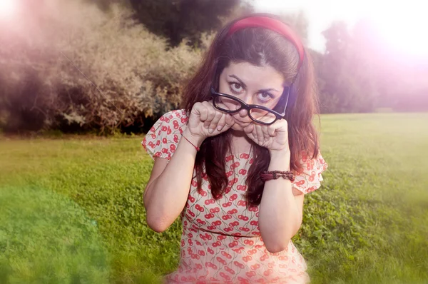 Girl with big glasses at the park — Stock Photo, Image