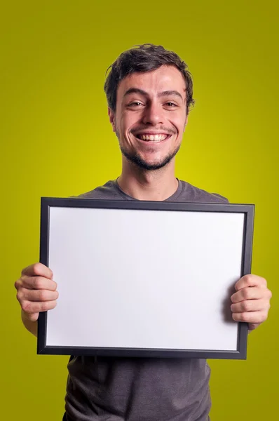 Fanny smiling guy showing sign — Stock Photo, Image