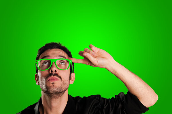 thoughtful man with green eyeglasses