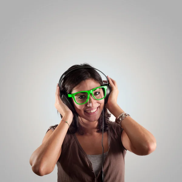 Beautiful girl listen to music — Stock Photo, Image