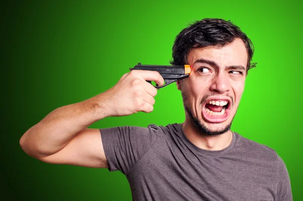 Suicide funny guy with gun — Stock Photo, Image