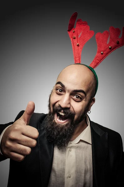 Positieve Kerstmis bebaarde man met grappige expressies — Stockfoto