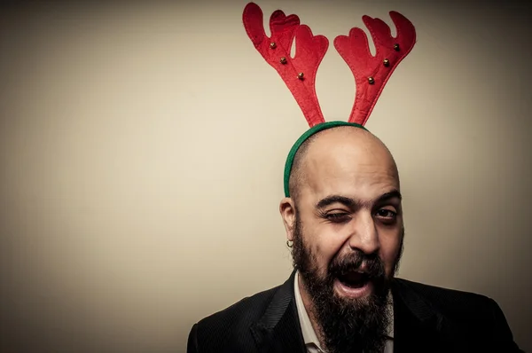 Guiño hombre barbudo navidad con expresiones divertidas — Foto de Stock