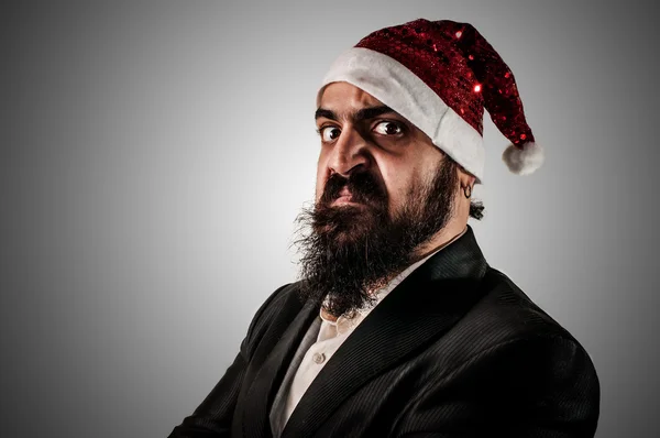 Kızgın modern şık Noel Baba uyguladıktan natale — Stok fotoğraf