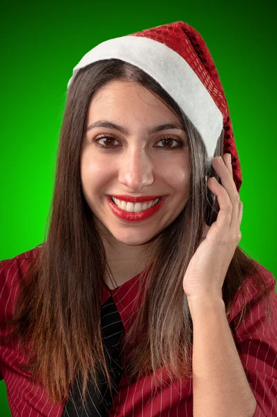 Smiling business christmas girl at the phone — Stock Photo, Image