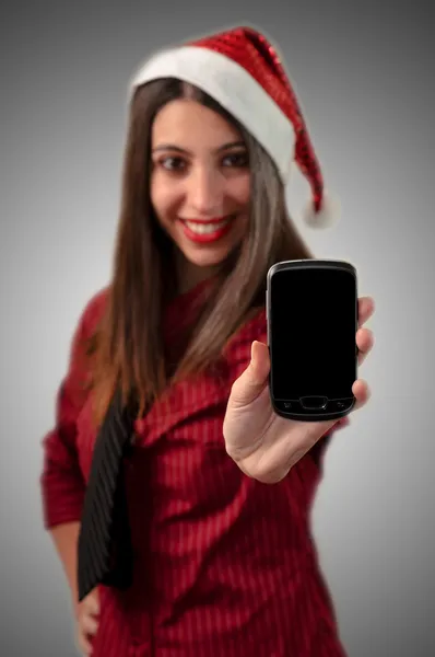 Sonriente negocio navidad mostrando smartphone —  Fotos de Stock