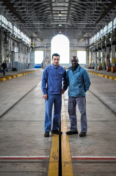 Workers at garage public transport — Stock Photo, Image