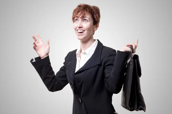 Mujer de negocios feliz con maletín —  Fotos de Stock