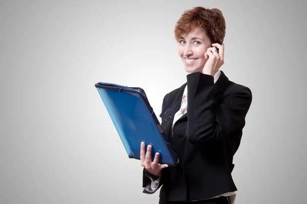 Éxito mujer de negocios con maletín y teléfono —  Fotos de Stock