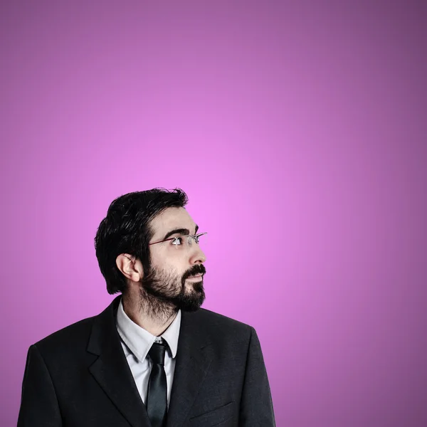 Bearded business man looking up — Stock Photo, Image