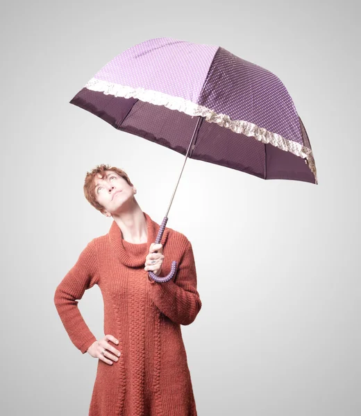 Beautiful woman with sweater and umbrella — Stock Photo, Image