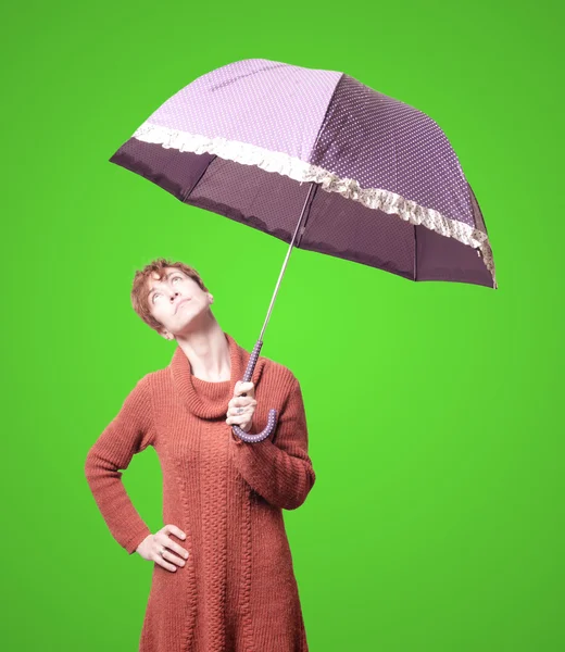Beautiful woman with sweater and umbrella — Stock Photo, Image