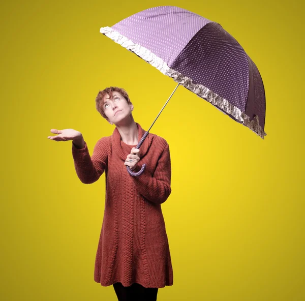 Beautiful woman with sweater and umbrella — Stock Photo, Image