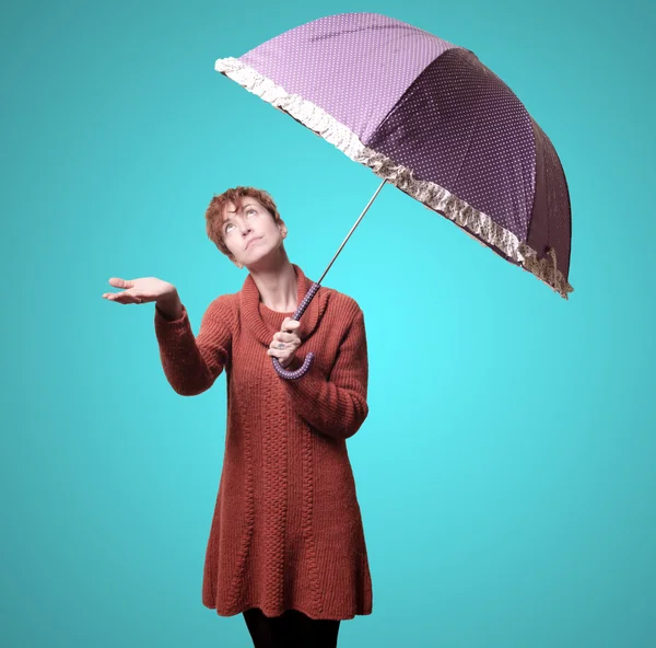 Beautiful woman with sweater and umbrella — Stock Photo, Image