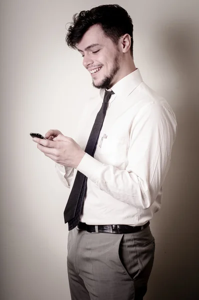 Hombre de negocios con estilo en el teléfono —  Fotos de Stock