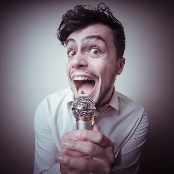 Funny stylish businessman singing — Stock Photo, Image