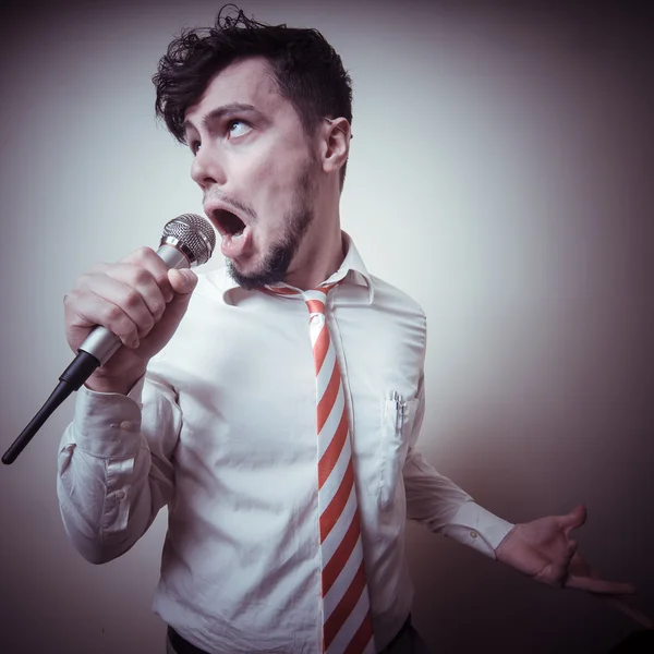 Funny stylish businessman singing — Stock Photo, Image