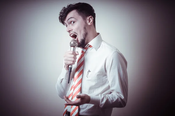 Funny stylish businessman singing — Stock Photo, Image