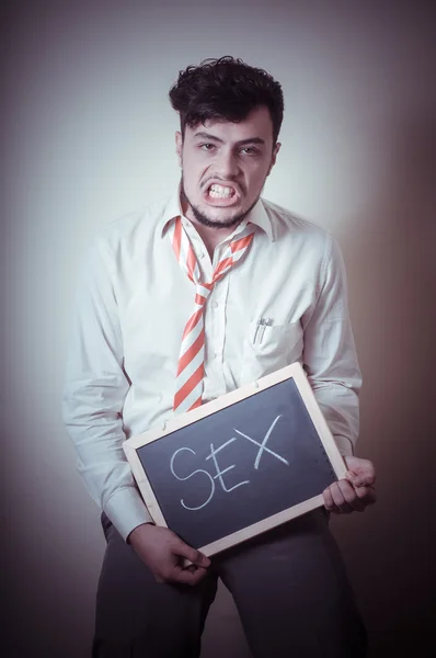 Businessman with a blank blackboard write sex — Stock Photo, Image