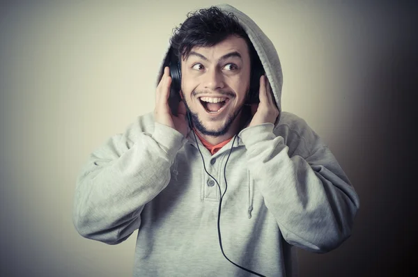 Niño con sudadera y auriculares —  Fotos de Stock