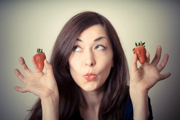 Beautiful woman with strawberries — Stock Photo, Image