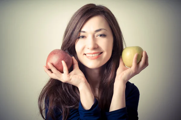 Beautiful woman with red and yellow apples — Stock Photo, Image