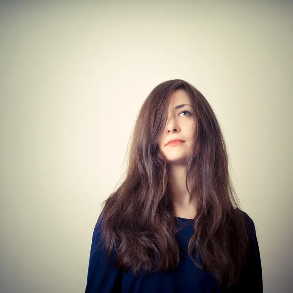 Serious woman with long hair — Stock Photo, Image