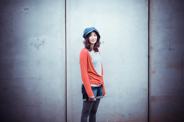 Beautiful stylish woman listening to music — Stock Photo, Image