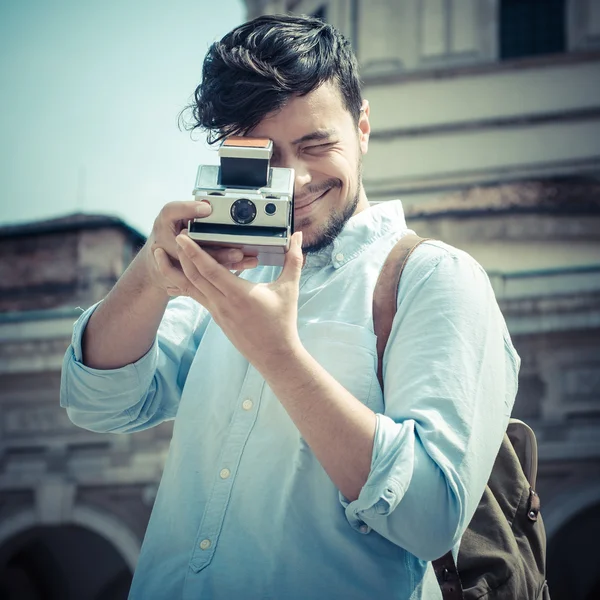 Stylish man in the street with old camera — Stock Photo, Image