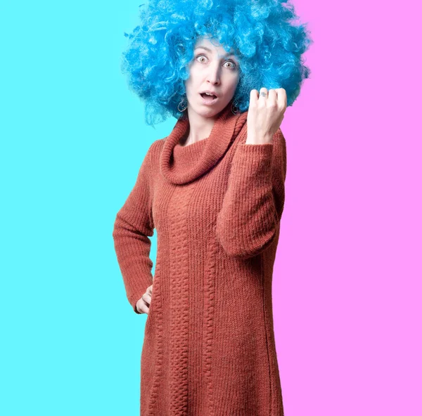 Beautiful girl with curly blue wig and turtleneck — Stock Photo, Image