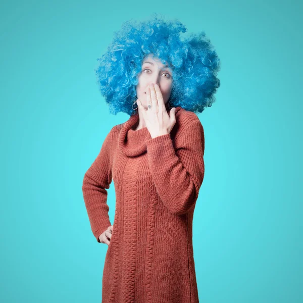 Beautiful girl with curly blue wig and turtleneck — Stock Photo, Image