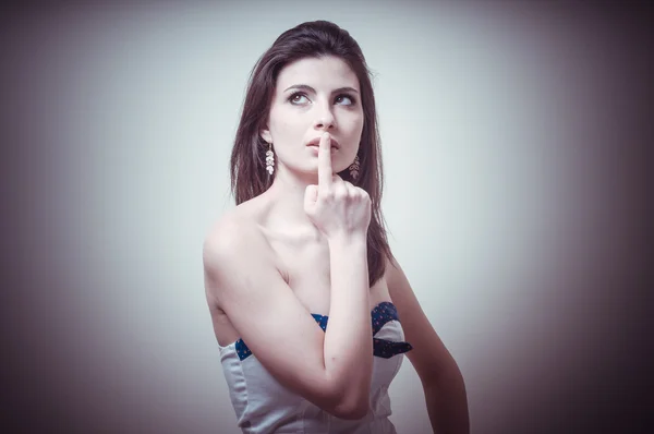 Vintage portrait of young woman thinking — Stock Photo, Image