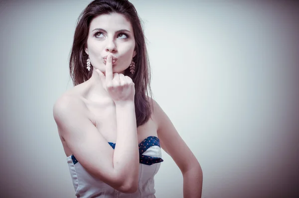 Vintage portrait of young woman thinking — Stock Photo, Image