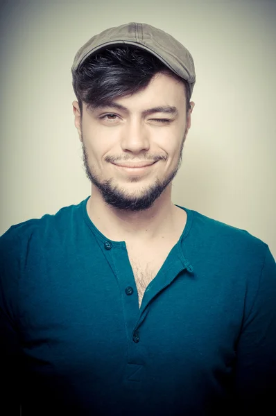 Young modern stylish man with cap — Stock Photo, Image