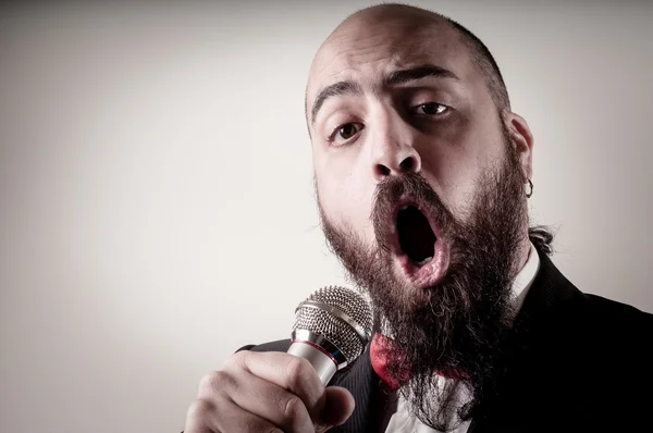 Funny elegant singer bearded — Stock Photo, Image