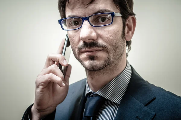 Affärsman i telefon — Stockfoto