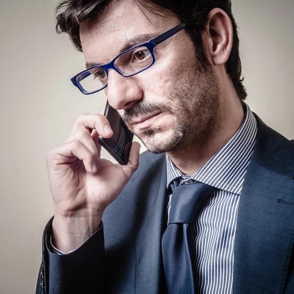 Affärsman i telefon — Stockfoto