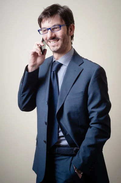 Affärsman i telefon — Stockfoto