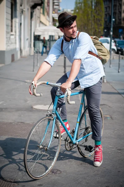 Hipster young man on bike — Stock Photo, Image