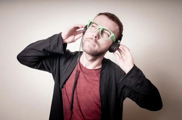 Stylish hipster listening to music — Stock Photo, Image