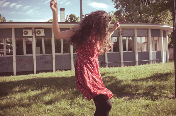 Eastern hipster vintage woman jumping — Stock Photo, Image