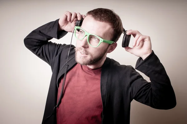 Stylish hipster listening to music — Stock Photo, Image