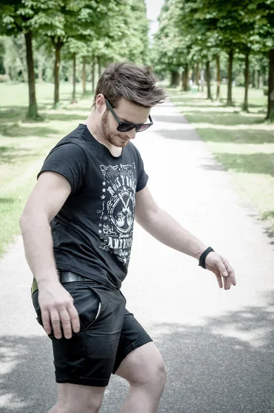 Stylish man in the park — Stock Photo, Image