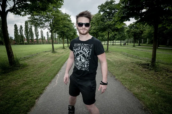 Stylish man in the park — Stock fotografie