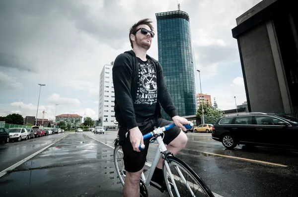 Stylish man on bike — Stock Photo, Image