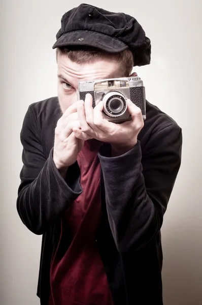 Hipster stylish fashion man with old camera — Stock Photo, Image