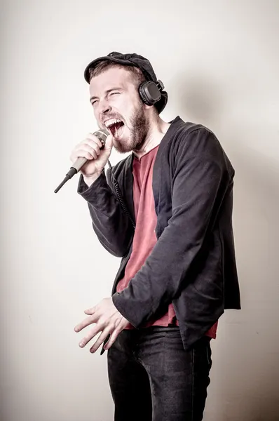 Hipster stylish fashion blonde man with headphones — Stock Photo, Image