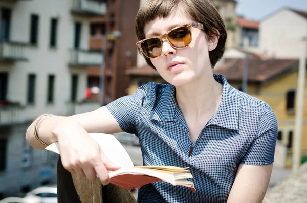 Young beautiful hipster woman reading book — Stock Photo, Image